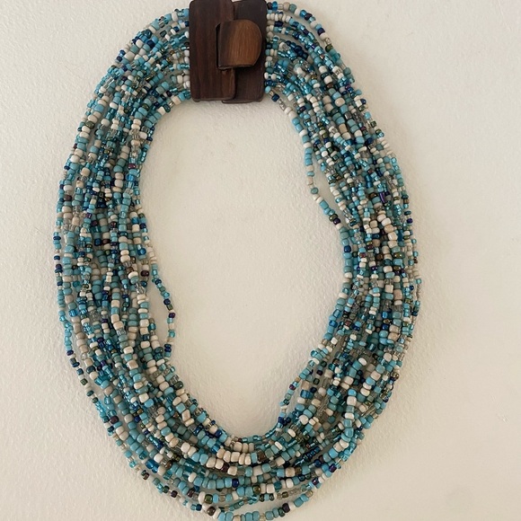 Unique Vintage Aqua Blue and White Beaded Necklace with carved wood clasp - Picture 3 of 9